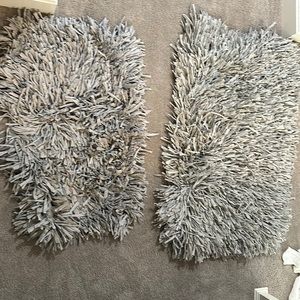 Two rugs grey one large one small
